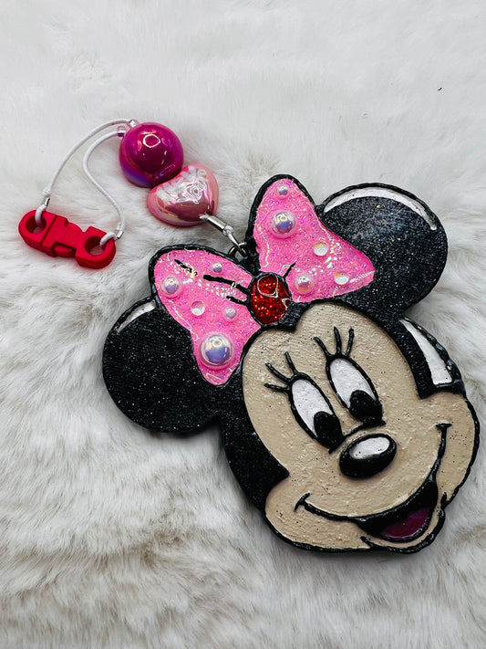 Freshie with Minnie Mouse design on a fluffy white surface