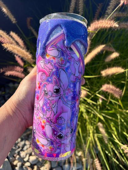 Hand holding a purple glittery tumbler with cartoon character Angel of Lilo & Stitch design against a natural background
